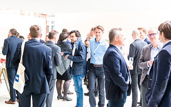 Attendees socializing at the 3D printing in medicine lecture