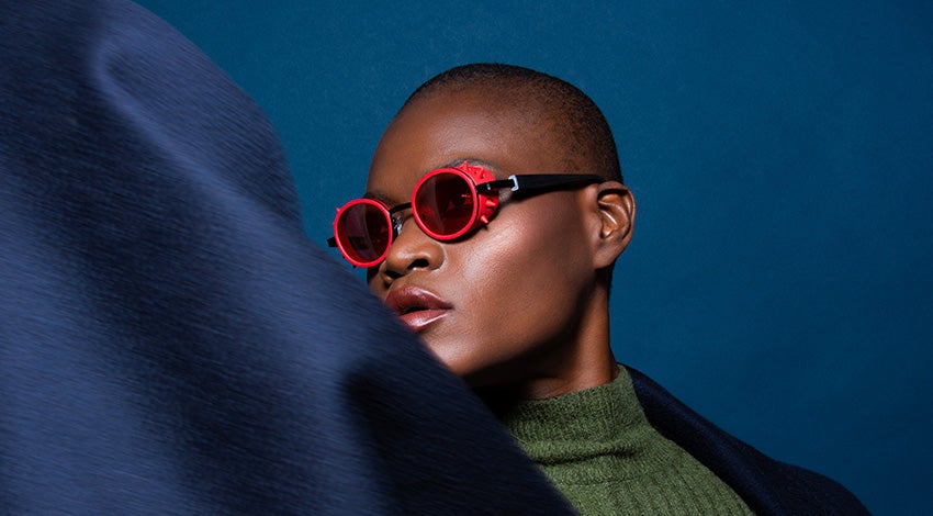 Model wearing red 3D-printed JF Rey frames  
