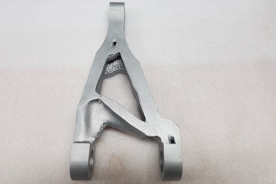 Triangular metal 3D-printed aerospace part with lattice structure 