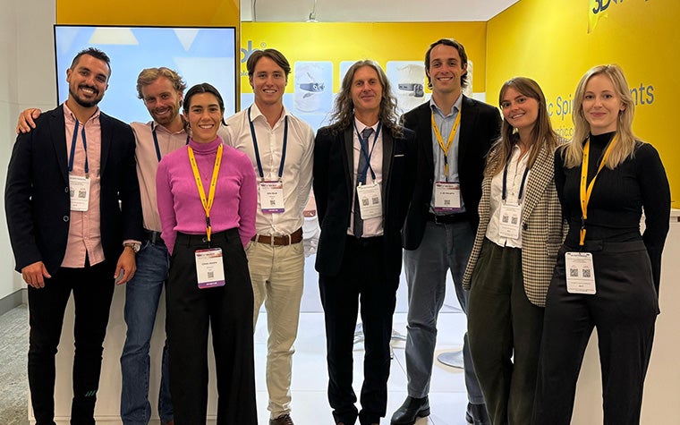 The 3DMorphic team members at a conference.