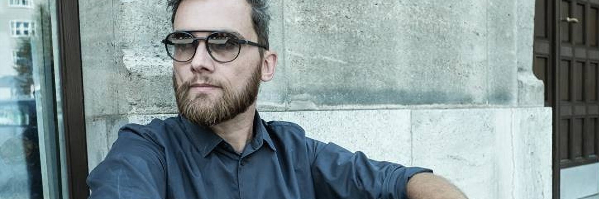 Eyewear designer Fabian Hofmann wearing sunglasses from his brand NEON Berlin