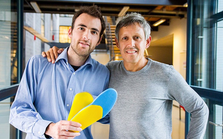 Dennis Vandenbussche presents phits orthotics to well-known Belgian physiotherapist Lieven Maesschalck in 2014.