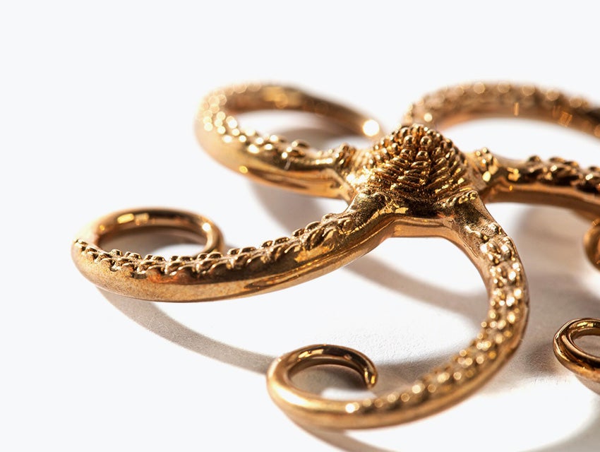 An ornate bronze model of a starfish made with lost-wax casting.