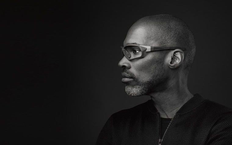 Black and white side view of a man wearing SEIKO eyewear