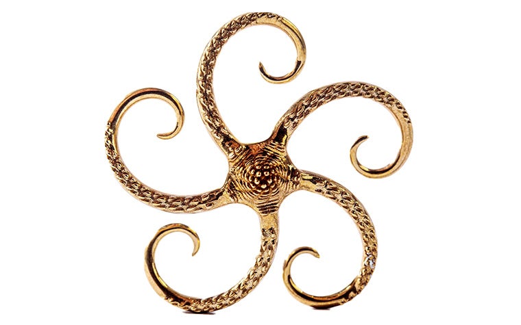 An ornate bronze model of a starfish made with lost-wax casting.