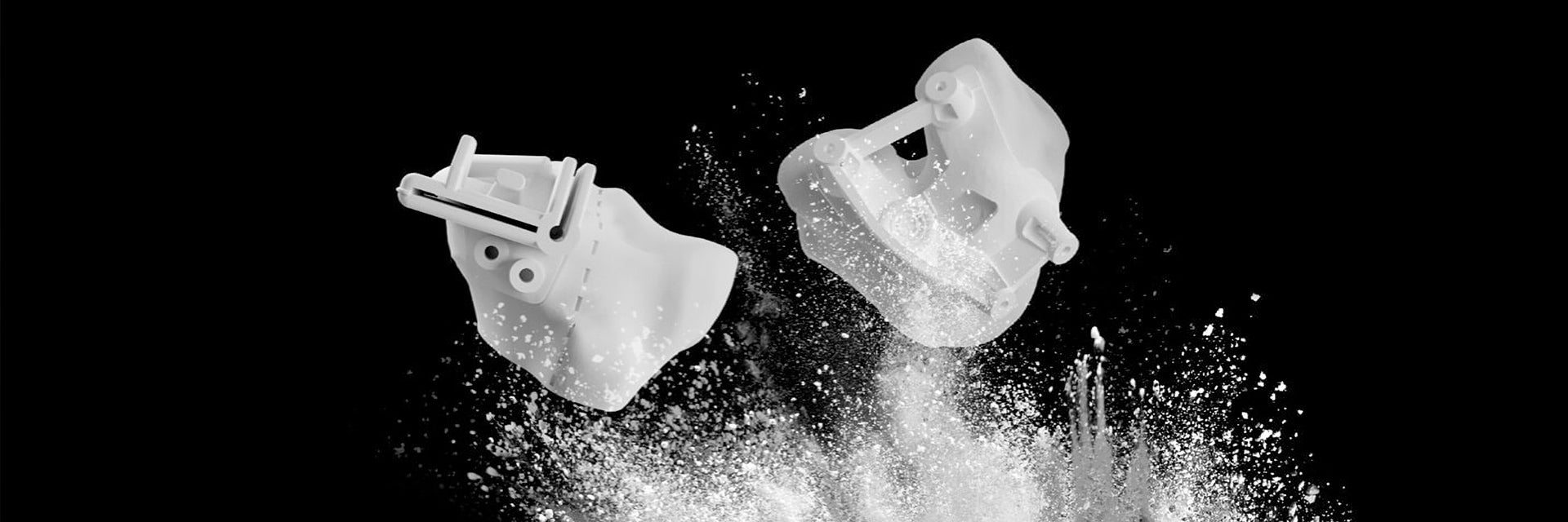 3D-printed knee guides falling into 3D printing powder