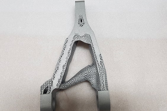 Triangular metal 3D-printed aerospace part with lattice structure 
