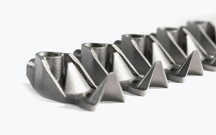 A series of metal 3D-printed production line parts