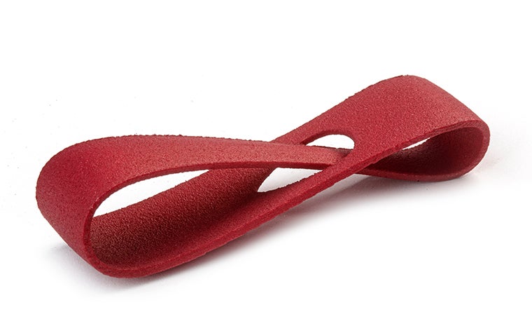 Matte Musterschlaufe 3D-gedruckt in PA-GF und eingefärbt in bordeaux.