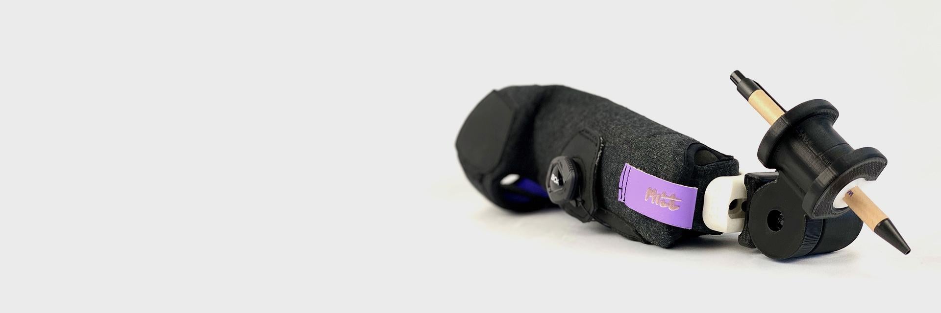 Mitt prosthetic arm with 3D-printed pen gripper attachment