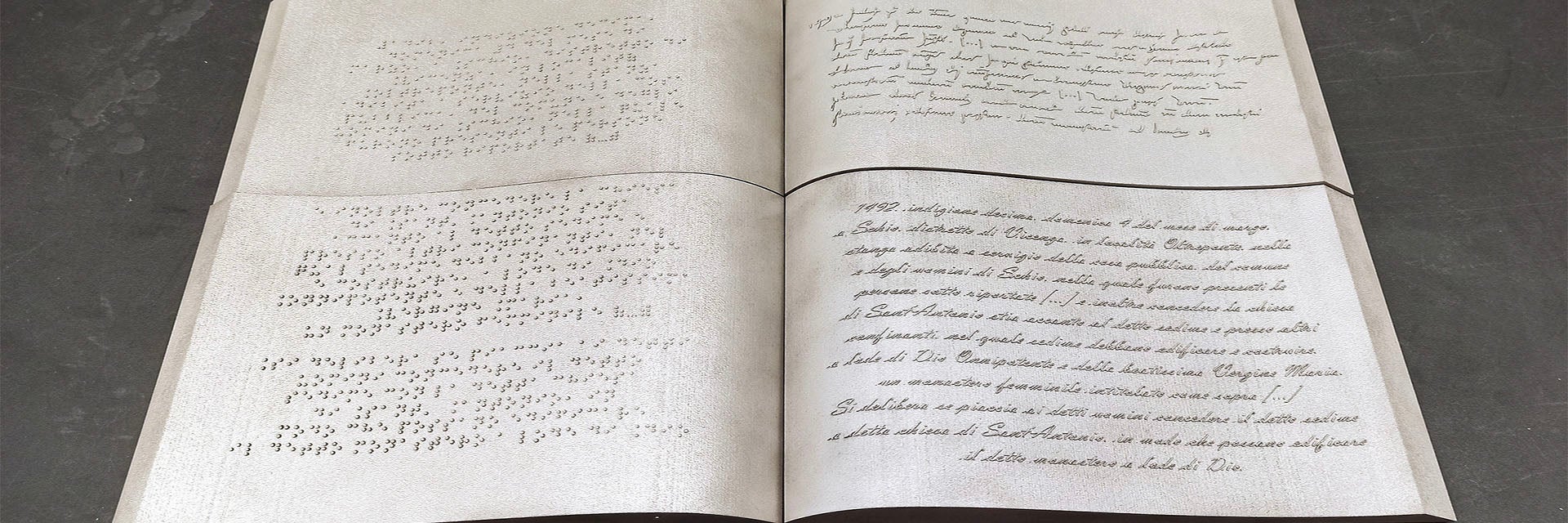 3D-printed replica of an ancient book with braille on one side