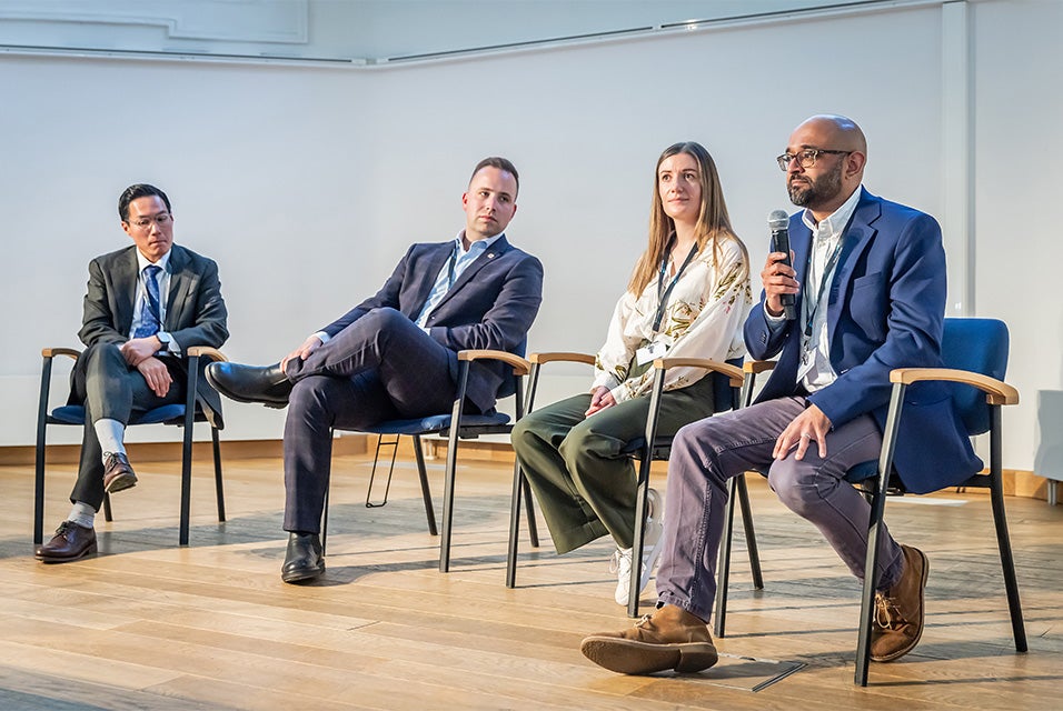 Four speakers sitting on stage during a panel at Materialise's 3D Planning and Printing in Hospitals Forum (2025).

From left to right: Dr. Chien Nguyen, 3D Lab Coordinator at UMC Utrecht; Dr. David Sibřina, Principal Researcher and Developer for the VR Lab, Institute for Clinical and Experimental Medicine; Dr. Lisa Ferrie, Biomedical Engineer, Leeds General Infirmary; Dr. Jiten Parmar, Consultant Oral and Maxillofacial Surgeon, Leeds General Infirmary