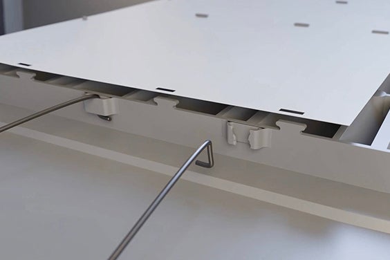 Close-up of a broken latch on the dado panel