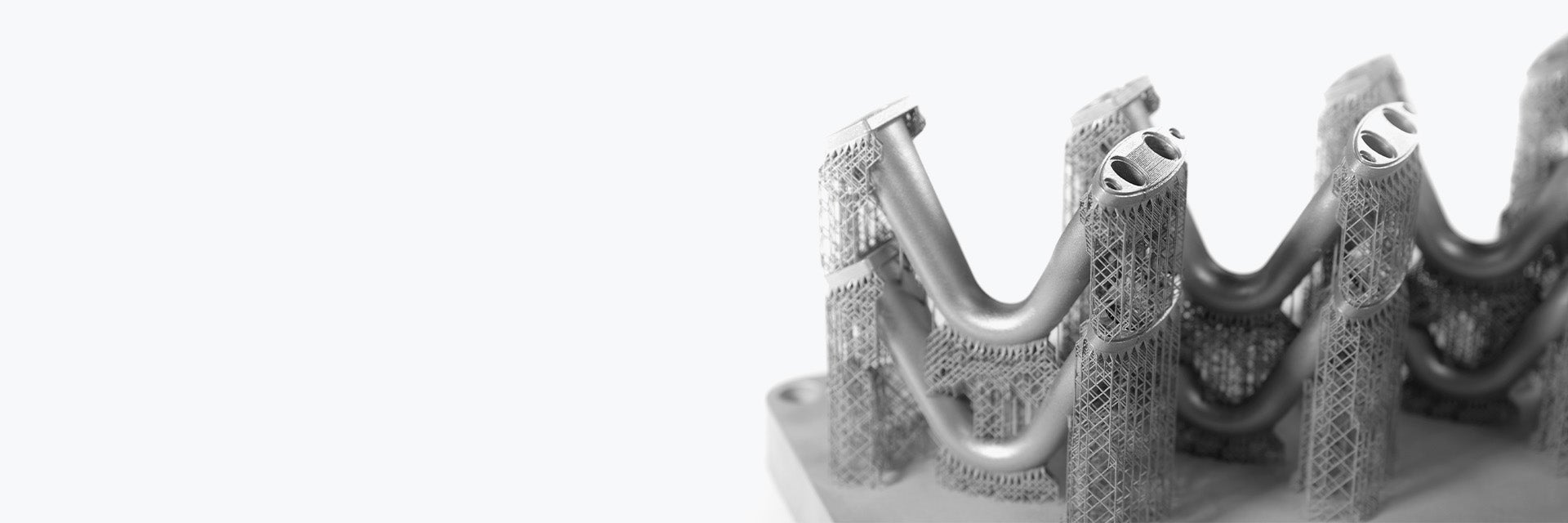 Close-up view of e-Stage for Metal+ support structures connecting parts to a build plate.