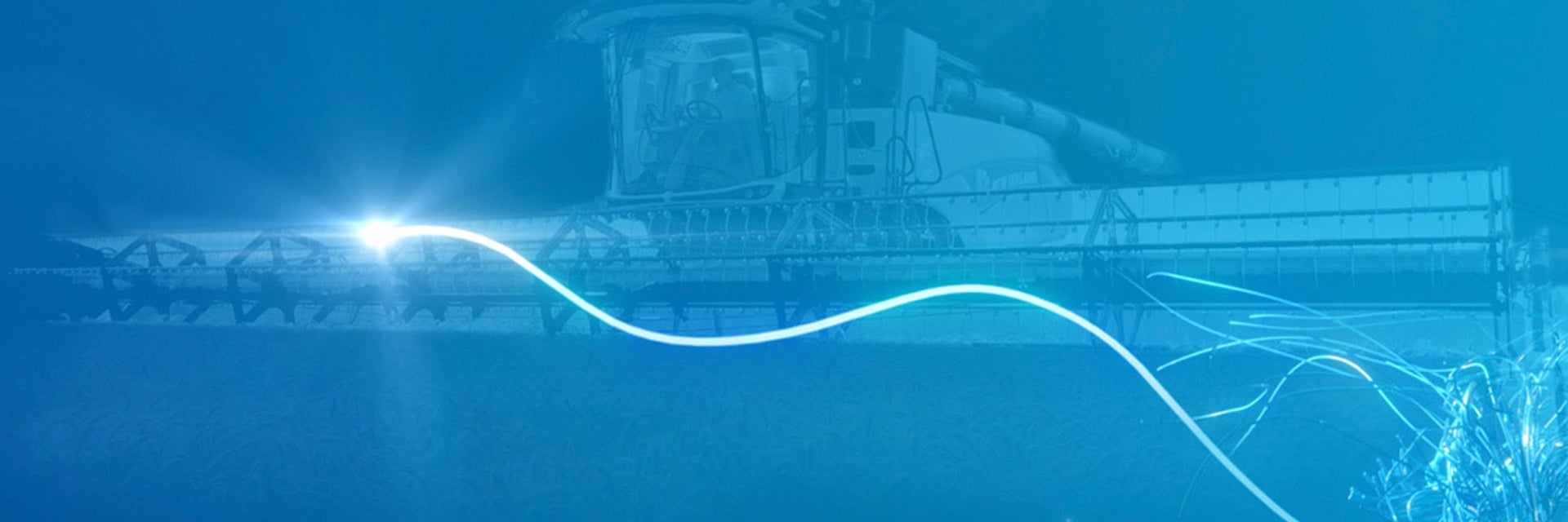 Beam of light in front of a farm machine