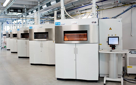 A room of 3D printers at Materialise’s headquarters in Leuven, Belgium 