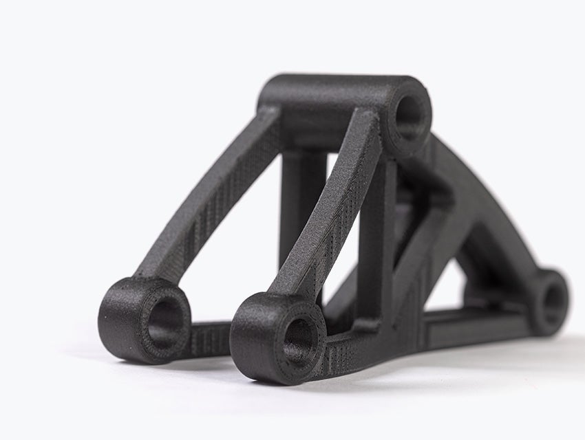 Black 3D-printed bracket in PA-CF