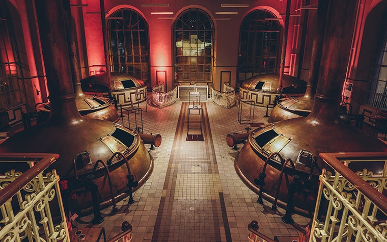 The dimly lit brew hall in De Hoorn, Leuven.