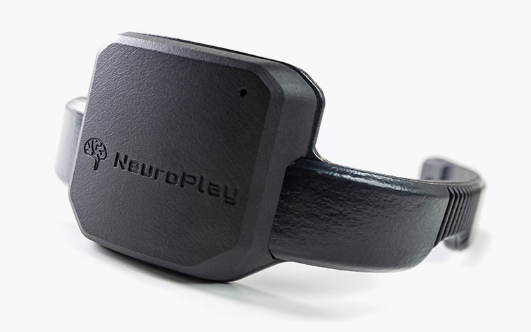 The 3D-printed NeuroPlay EEG headset casing with the word NeuroPlay embossed on the front.