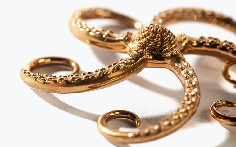 An ornate bronze model of a starfish made with lost-wax casting.