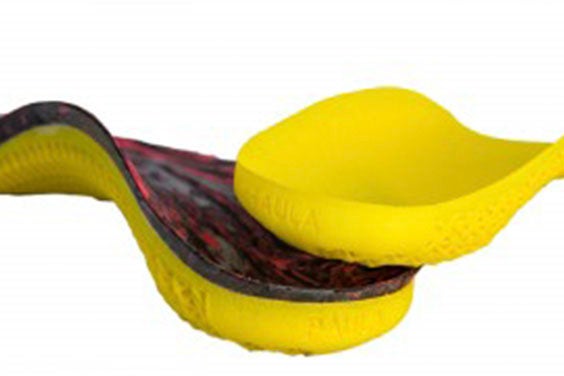 Personalized, 3D-printed insoles with Paula's name etched on the back