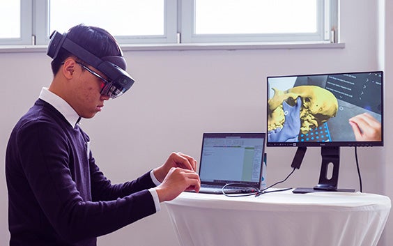 Man using augmented reality to test a surgical plan