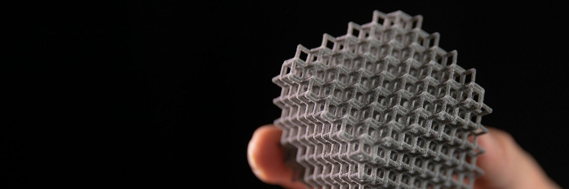 Geometric shape 3D printed in TPU against a black background