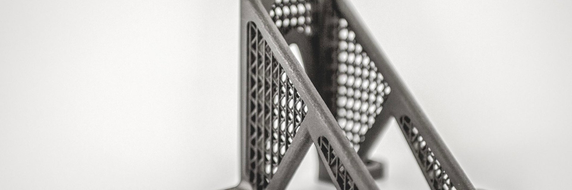 Close-up of 3D-printed titanium aerospace part 