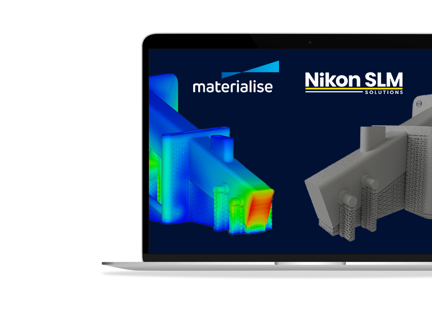 2つのビルドを表示するスクリーンセーバー付きのノートパソコン。左のビルドはMagicsシミュレーションモジュールで解析中の3Dモデルで、右のビルドはシミュレーションソフトを起動していない3Dモデル。画面上部には "Materialise "と "Nikon SLM Solutions "の文字がある。