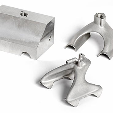 94% Lighter, 50% Cheaper, and More Performant: Optimizing the Design of a Metal Suction Gripper 