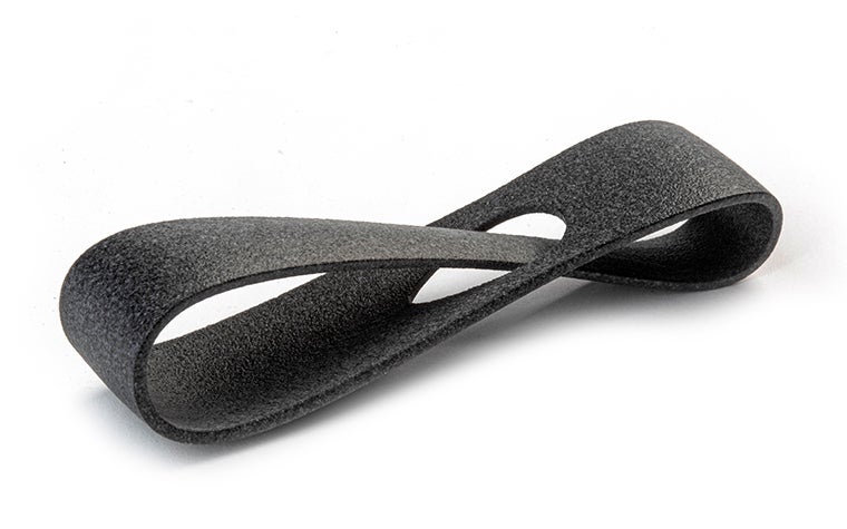 A black 3D-printed loop made from PA12 (MJF) using Multi Jet Fusion, with an extra-smooth finish.