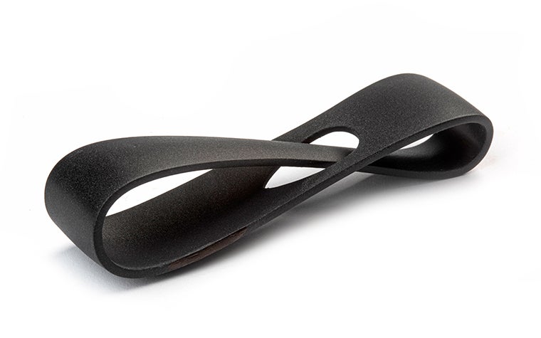 A black 3D-printed loop, finished with primer and a fine-textured paint.