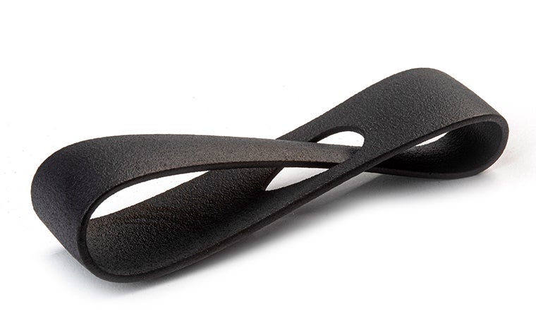 A black 3D-printed loop made from PA12 (MJF) using Multi Jet Fusion, with a color-dyed finish.