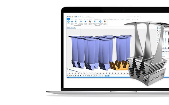 Laptop screen showing Materialise Magics with identical parts with labels and a metal 3D-printed version of the part popping out of the screen