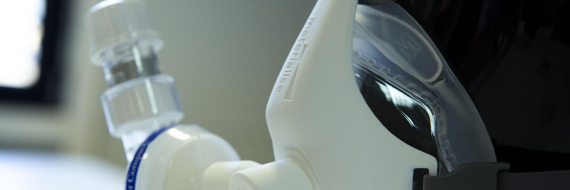 Non-invasive PEEP mask on a mannequin with 3D-printed parts