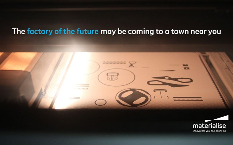 A Multi Jet Fusion powder bed printing several parts.