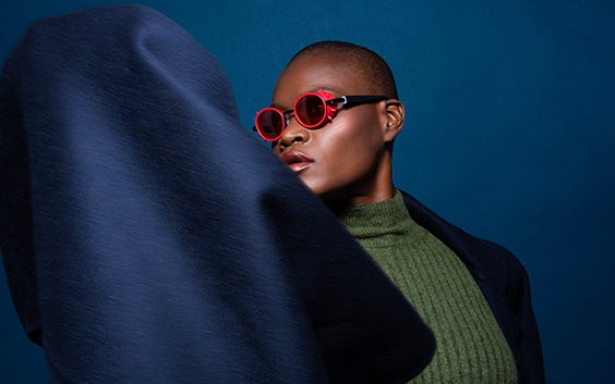 Model wearing red 3D-printed JF Rey frames  