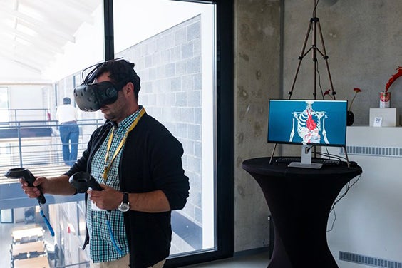 Man viewing 3D anatomical models in VR