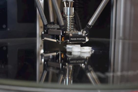 3D printer printing a part