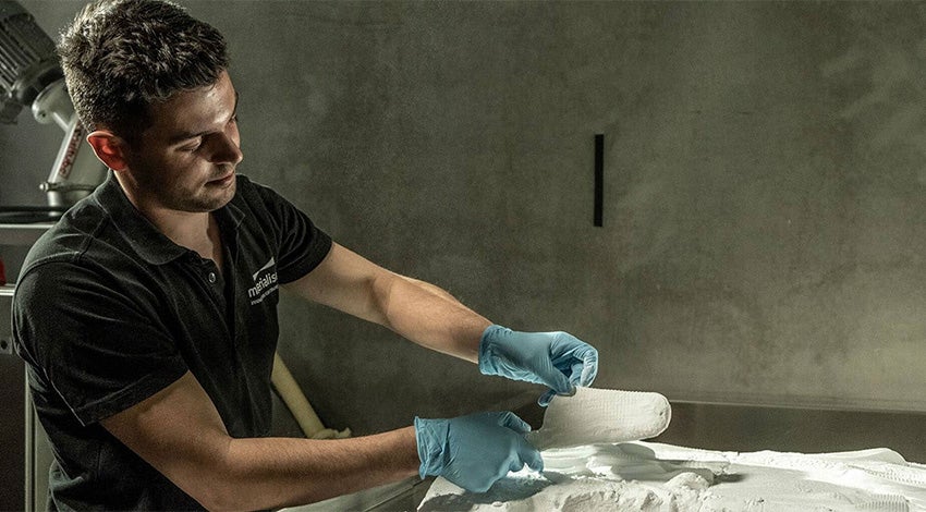 Materialise team member checks 3D-printed orthotics