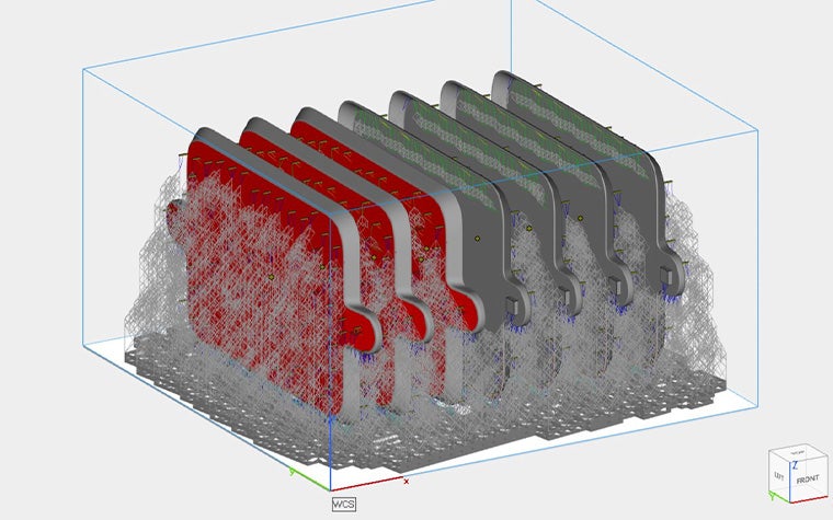 a 3D image of tightly stacked stereolithography parts in the Magics SDK software.