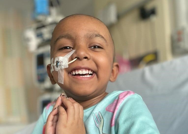 Image of Esha smiling at camera