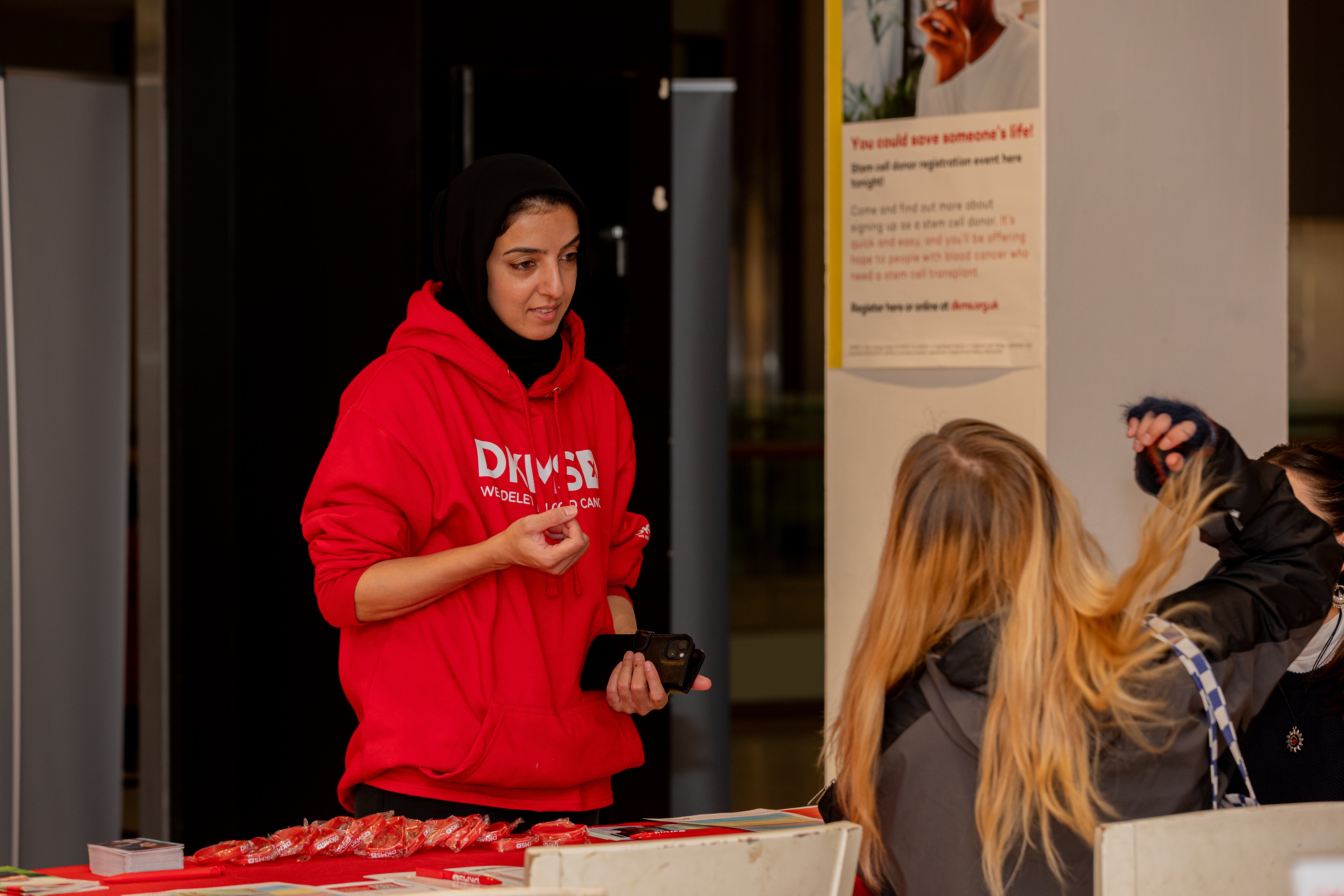 DKMS volunteer at event