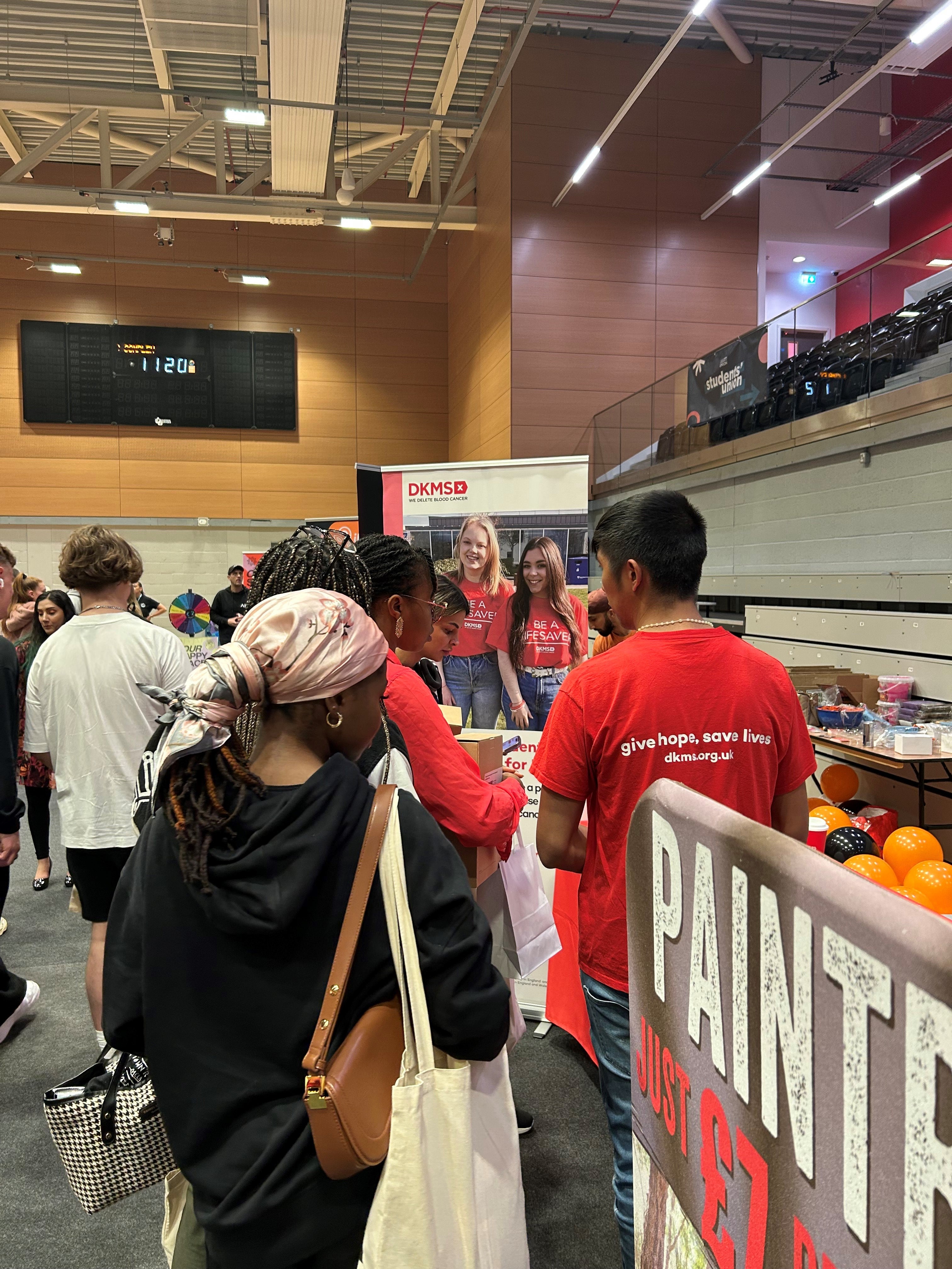 University students at a DKMS stand during Freshers fair