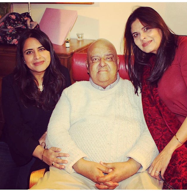 Ana Rasheed and family smiling at the camera. 