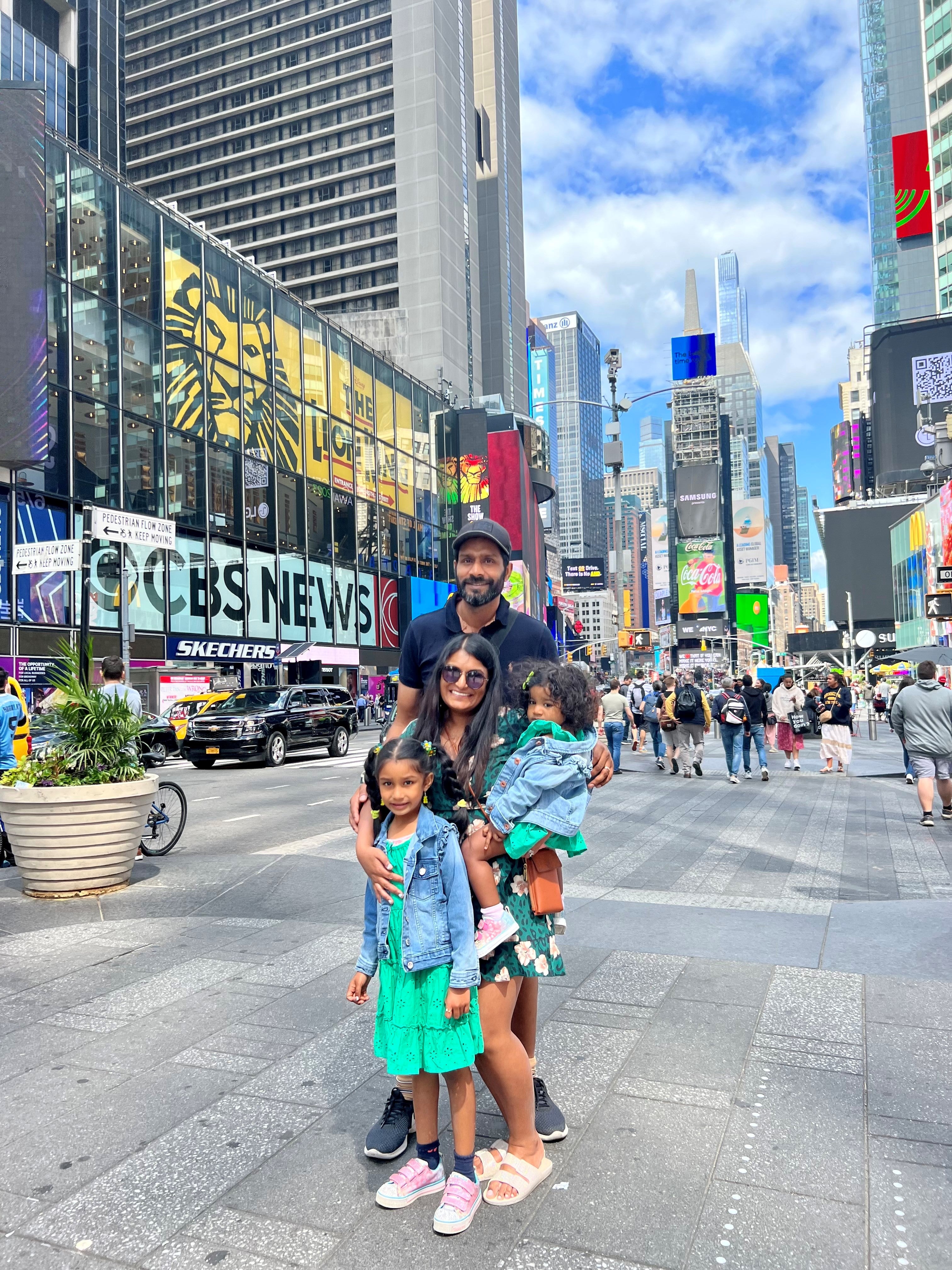 Poonam with her husband and children in New York