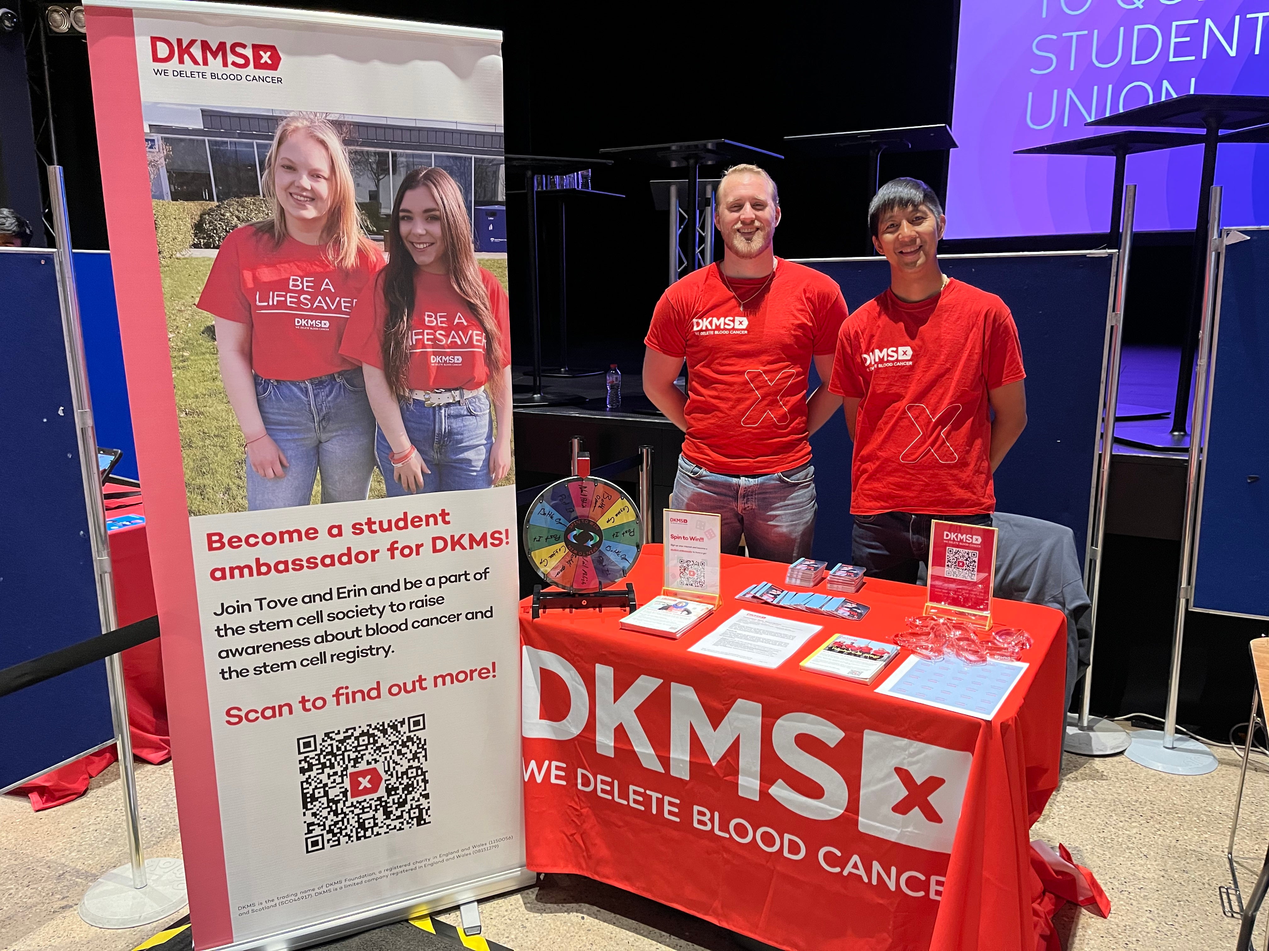 Two DKMS staff at a registration event