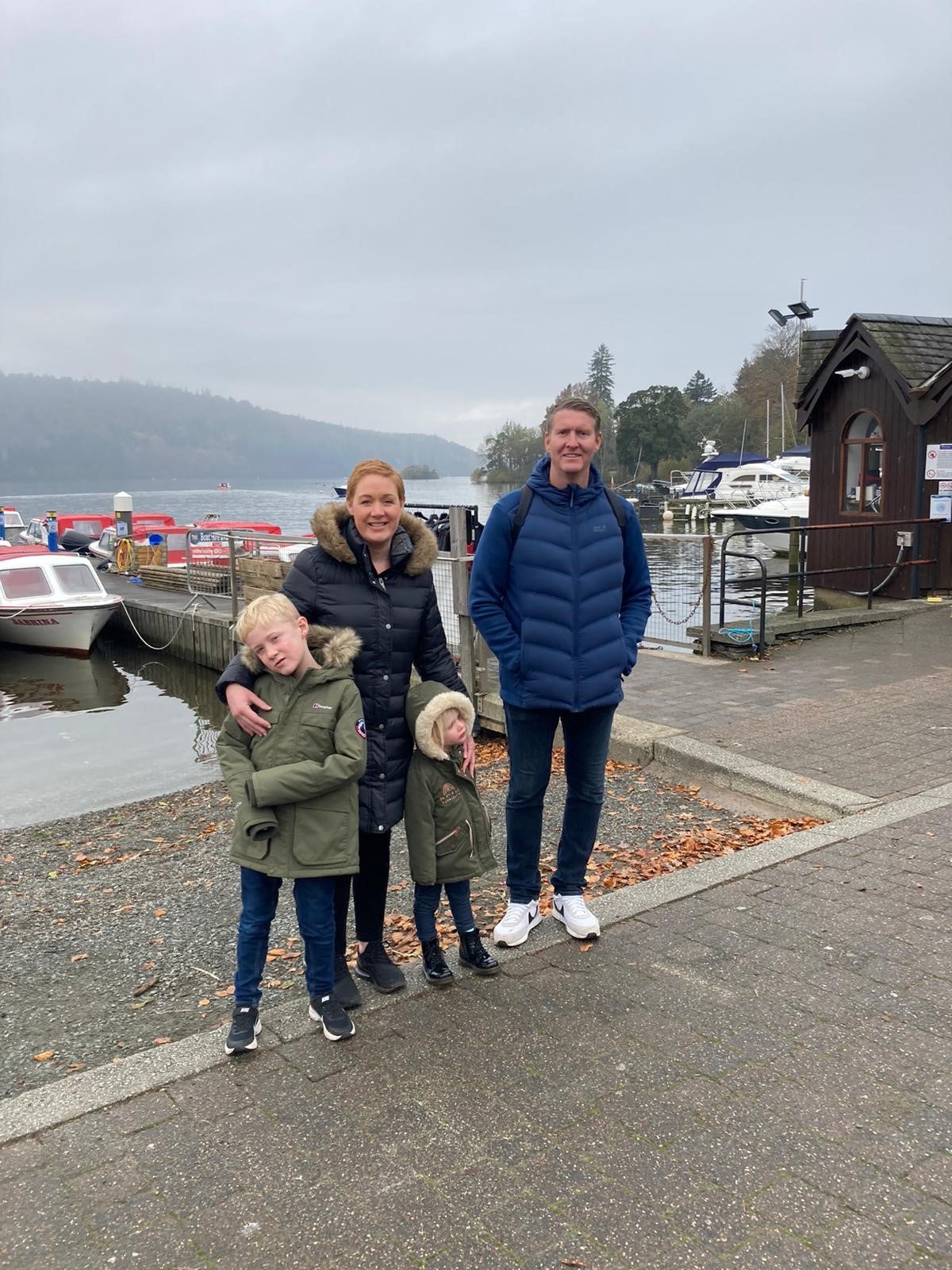 Image of Helen and her family at the harbor 
