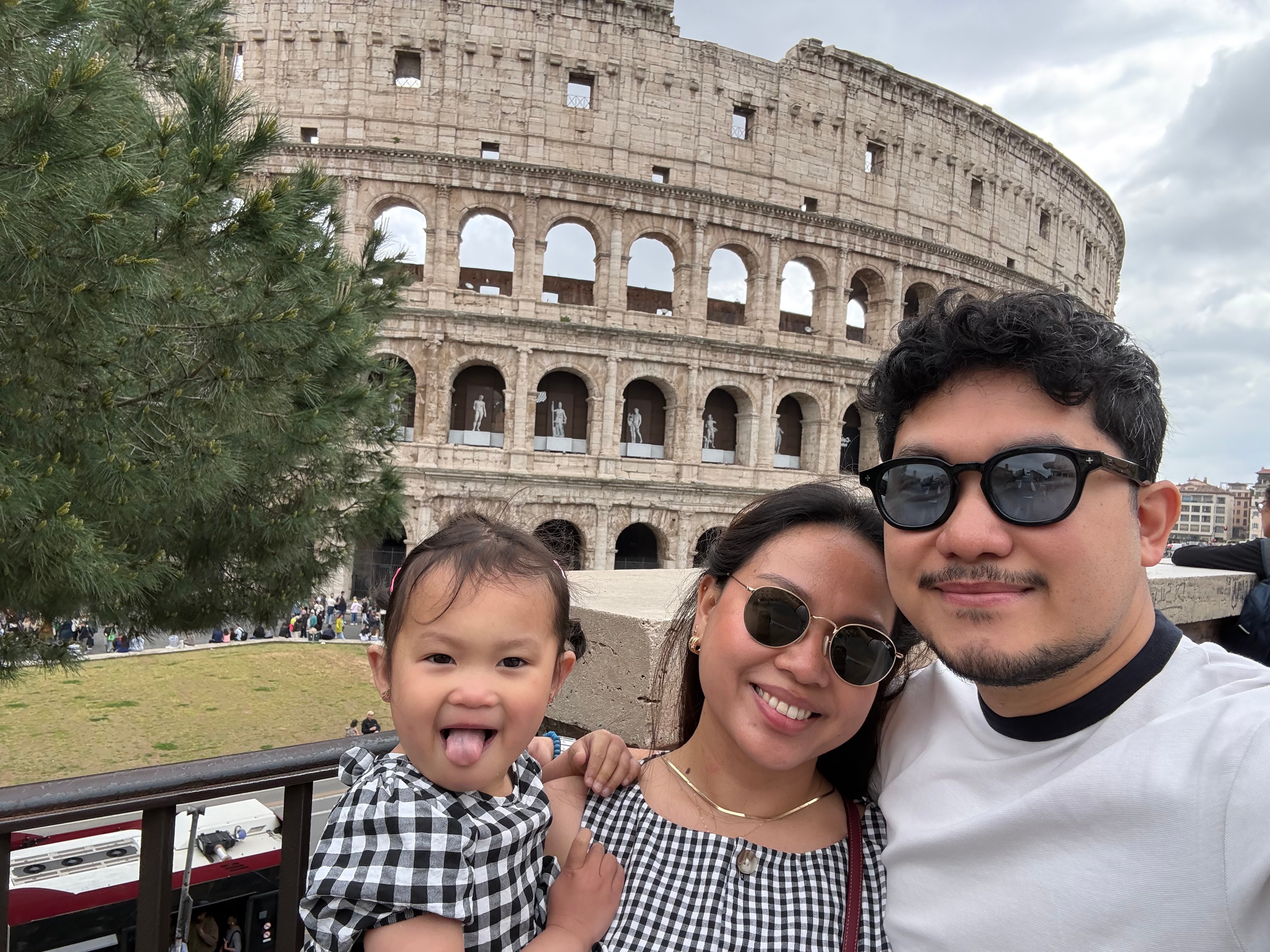 Oncology Nurse Jansen from Bath pictured smiling with her family outside the Colliseum in Rome