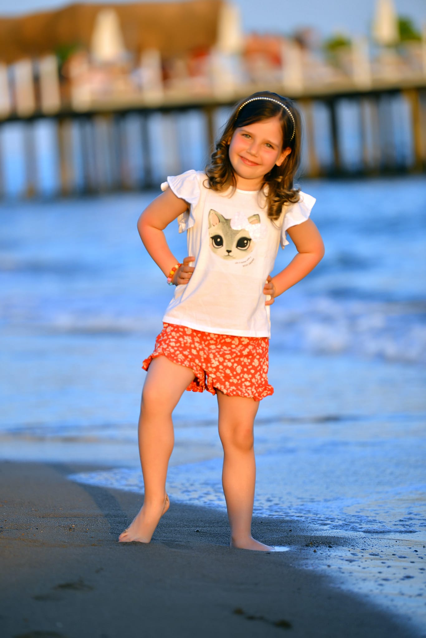Mia standing on the beach